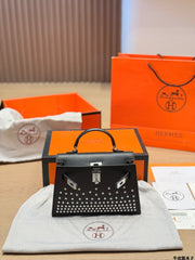 Leather version, Hermès Kelly Mini II studded bag