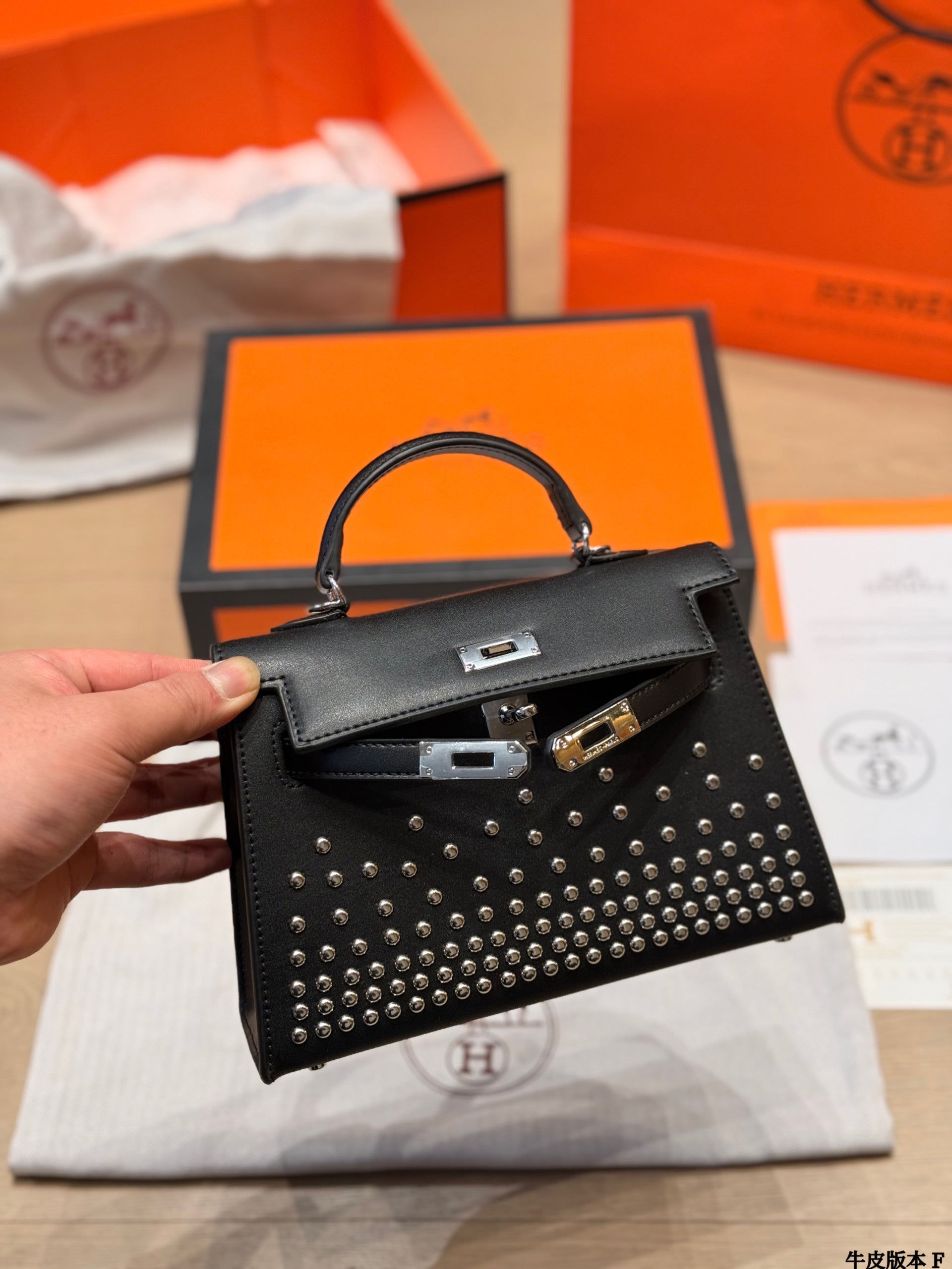 Leather version, Hermès Kelly Mini II studded bag