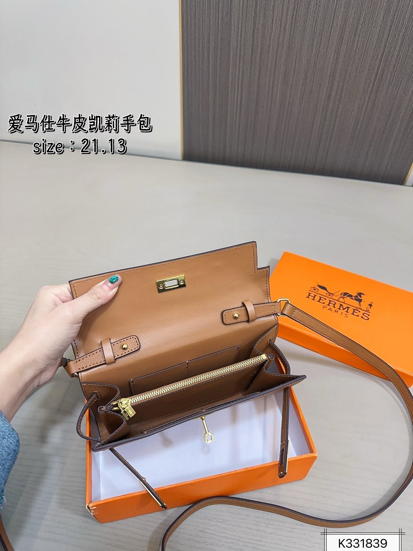 Leather Hermès Kelly handbag with box