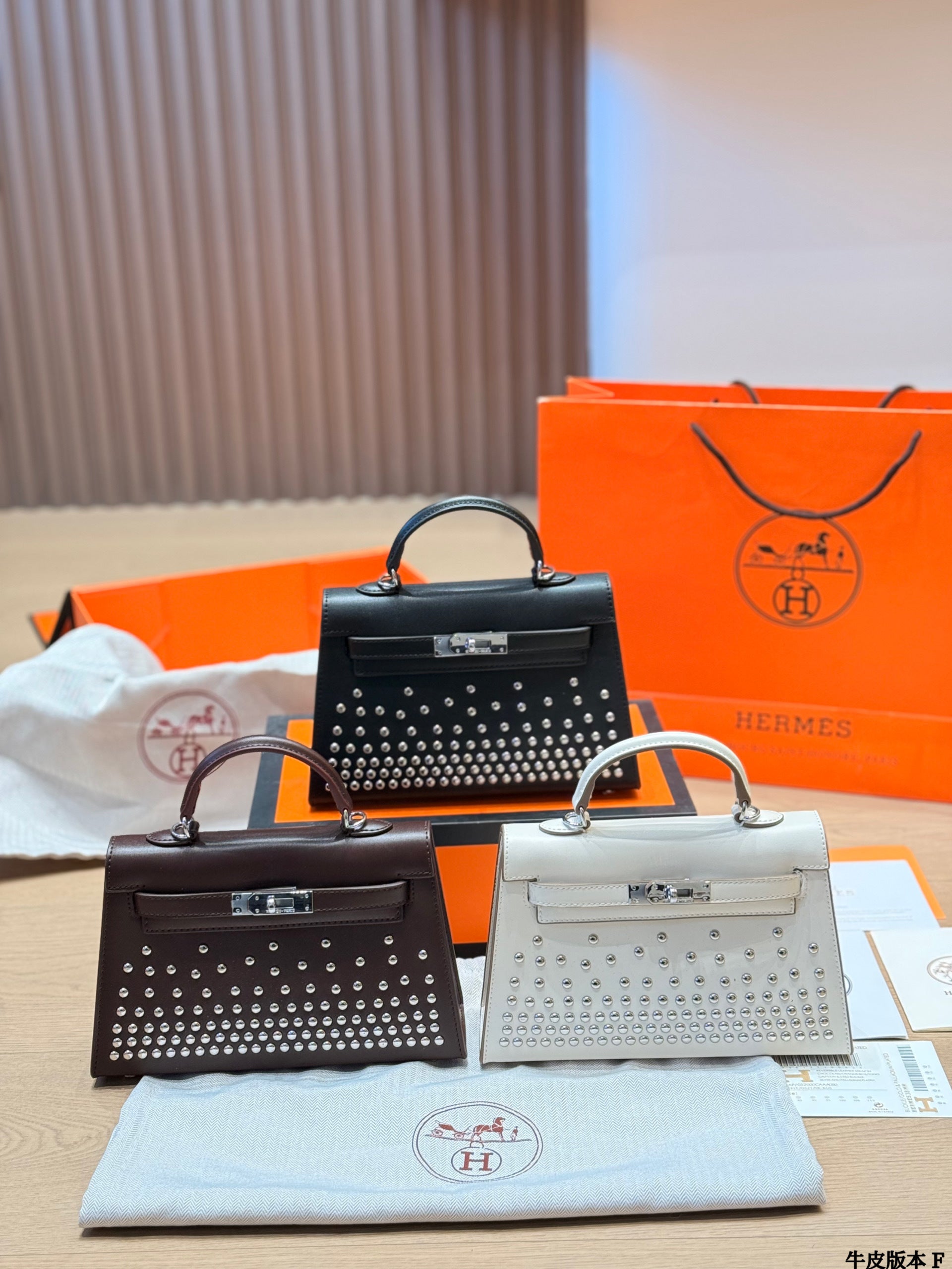 Leather version, Hermès Kelly Mini II studded bag