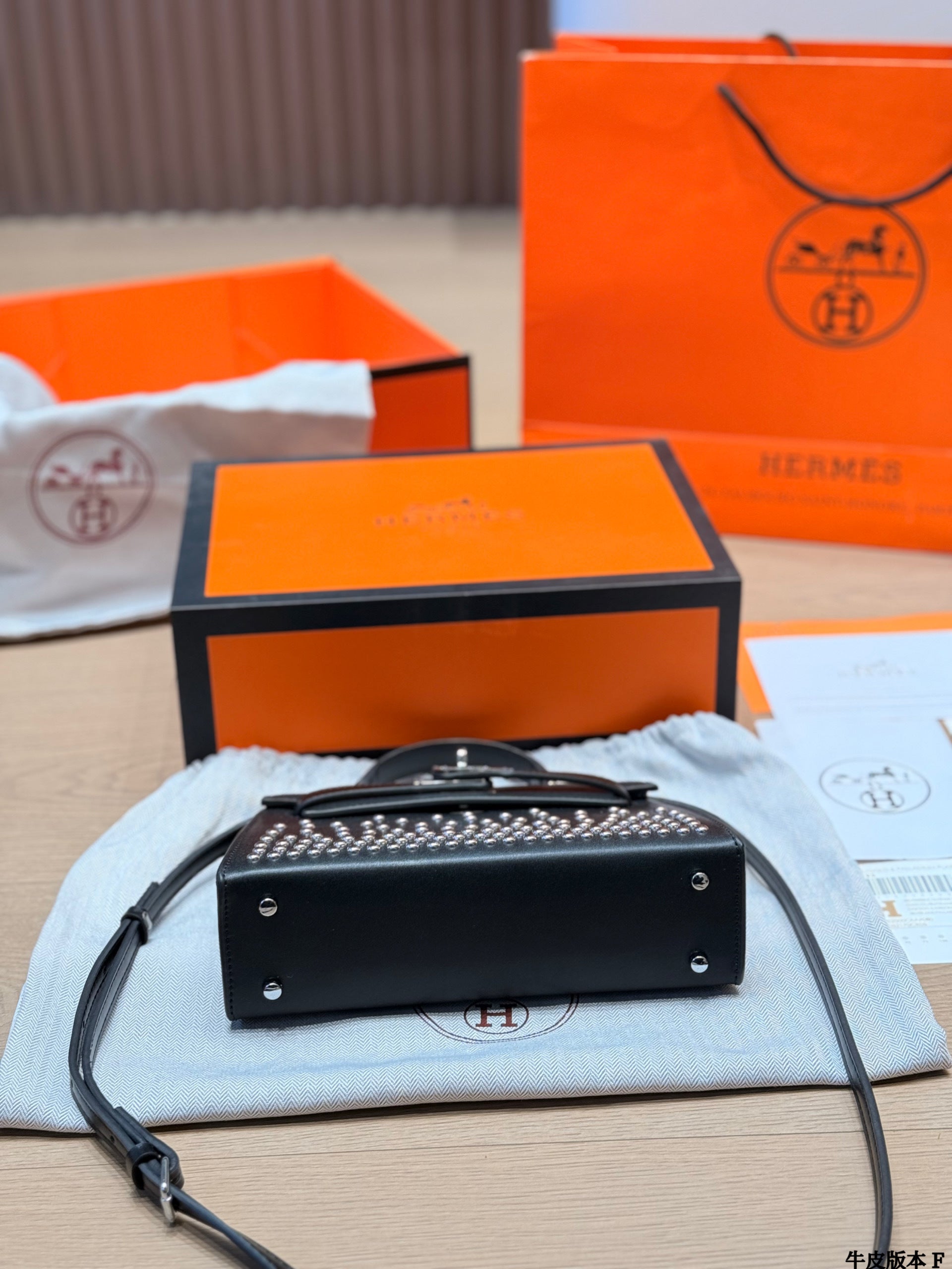 Leather version, Hermès Kelly Mini II studded bag