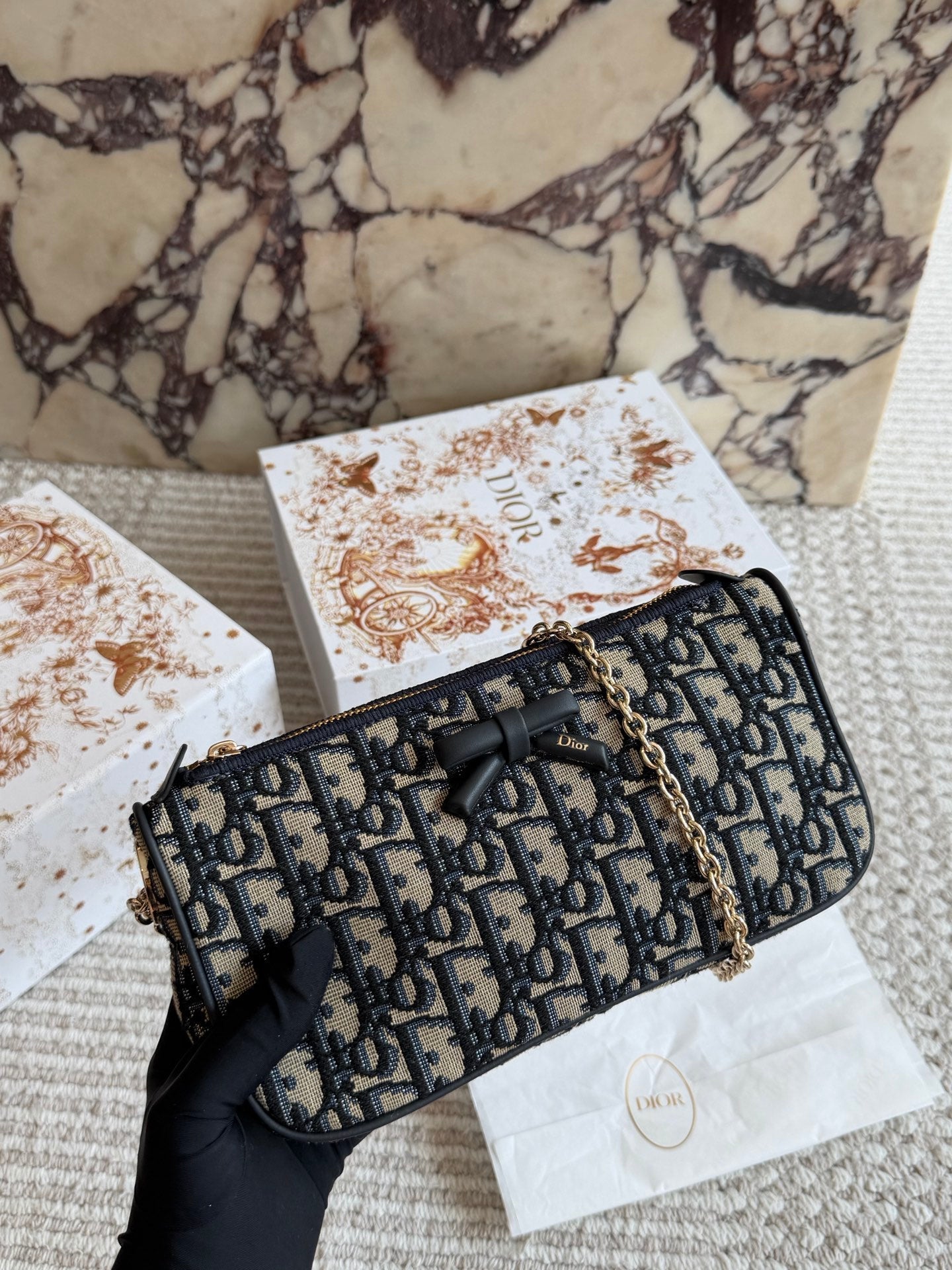 Dark blue monogram underarm bag