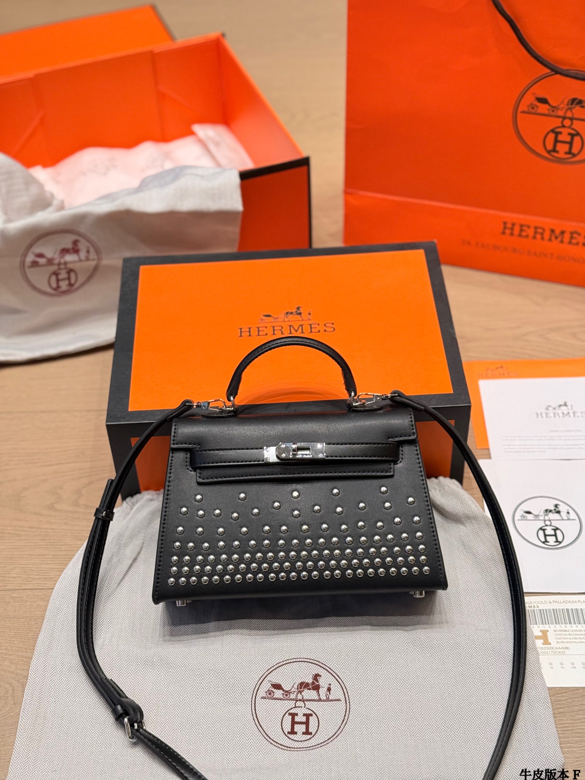 Leather version, Hermès Kelly Mini II studded bag