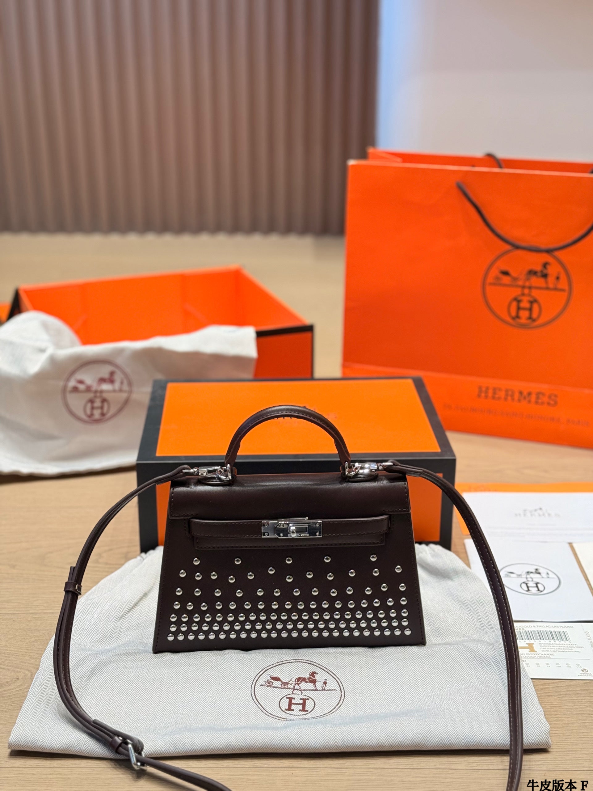 Leather version, Hermès Kelly Mini II studded bag