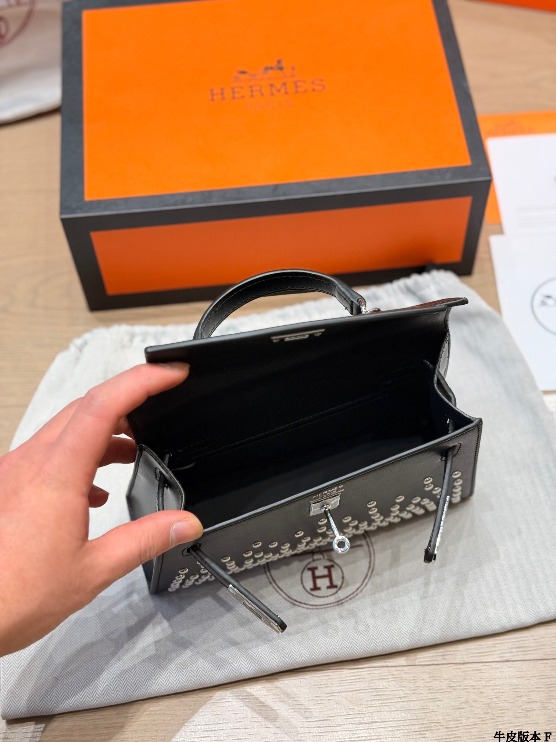 Leather version, Hermès Kelly Mini II studded bag