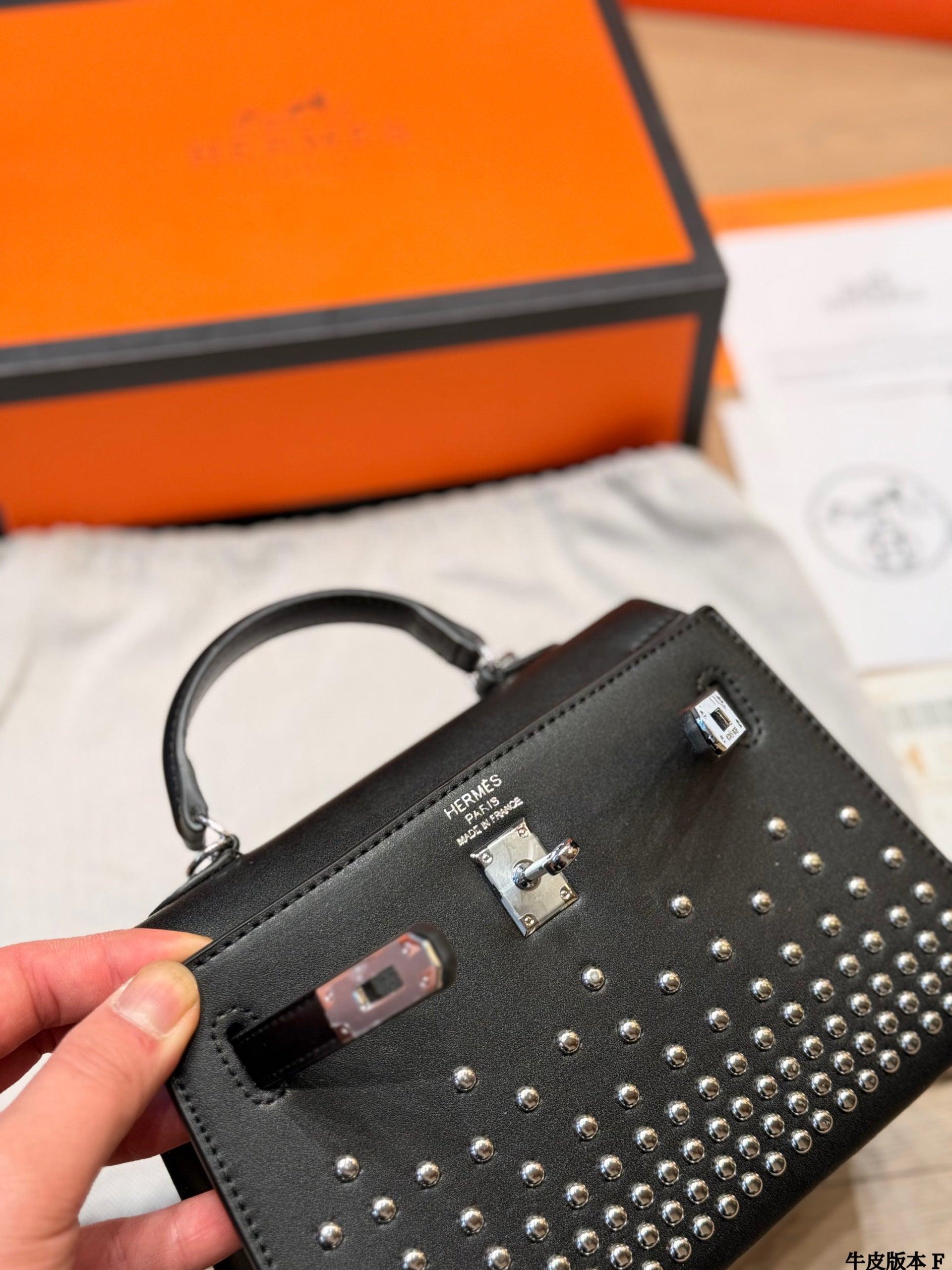 Leather version, Hermès Kelly Mini II studded bag