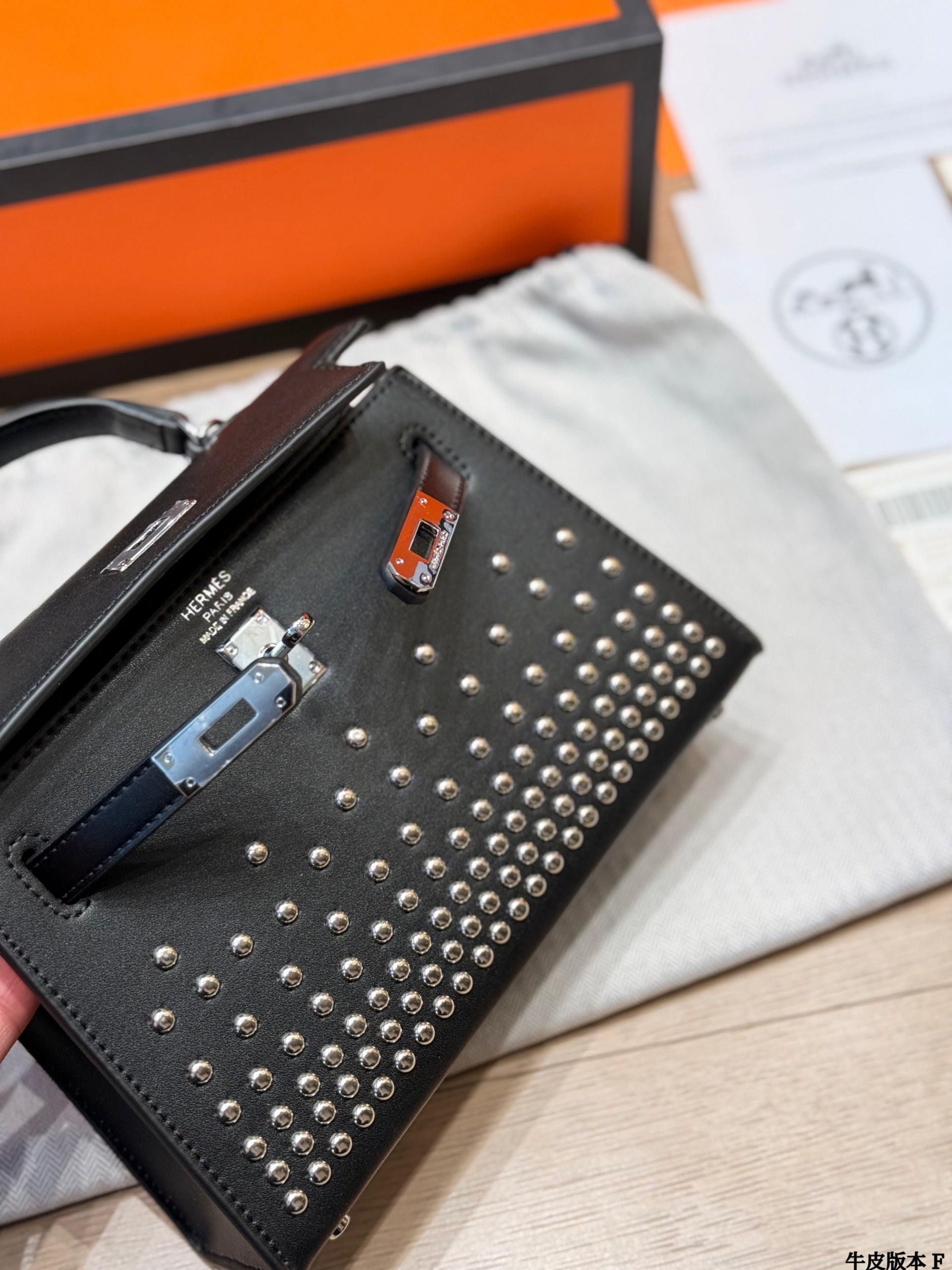 Leather version, Hermès Kelly Mini II studded bag