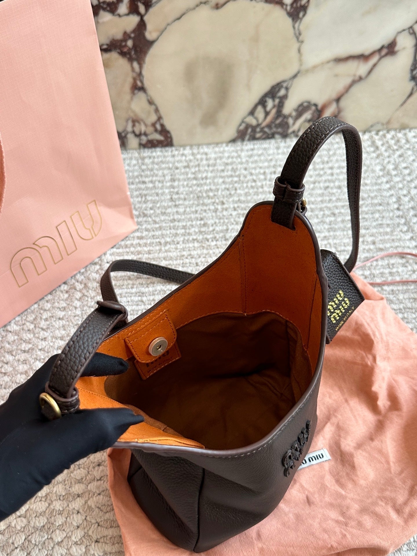 Miu Miu brown leather crossbody bag