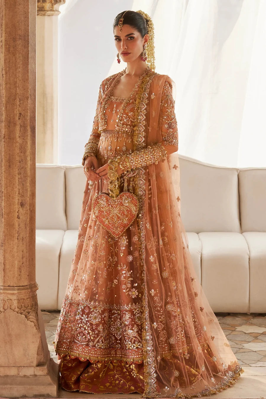 Gul-e-Mahnoor peach and gold embellished bridal gown with dupatta and matching potli bag